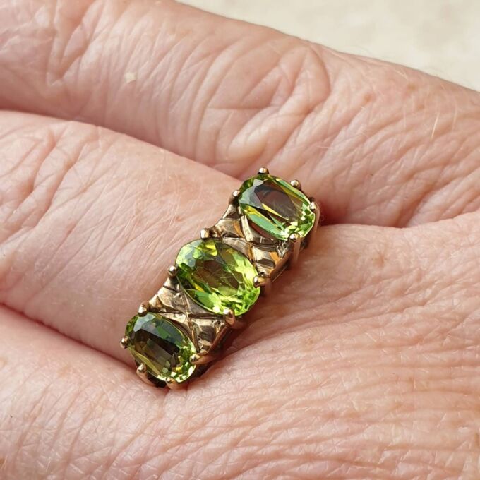 Peridot Three Stone Ring in 9ct Gold.