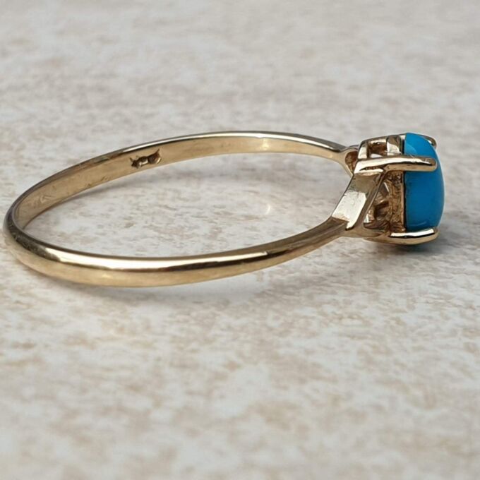 Turquoise Coloured Cabochon in 9ct Gold,  a UK O or a US 7 1/2.