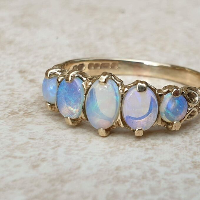 Graduating Five Stone Opal Ring in 9ct Gold,  a UK O or a US 7 3/4.