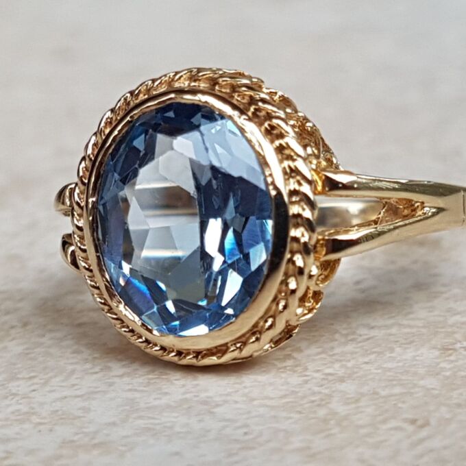 Pretty Synthetic Blue Spinel Solitaire Ring in 9ct Gold, a UK O or a US 7 1/4.