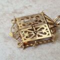 Quirky Window Shutter Gardeners Pendant in 9ct Gold.