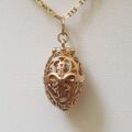 Reserved – Intricate Opening Egg Pendant in 9ct Gold.