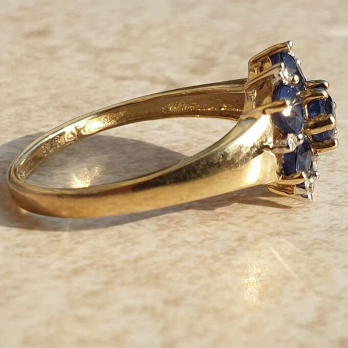 Tanzanite And Diamond Cluster Ring in 9ct Gold,  a UK J 1/2 or a US 5 1/4.