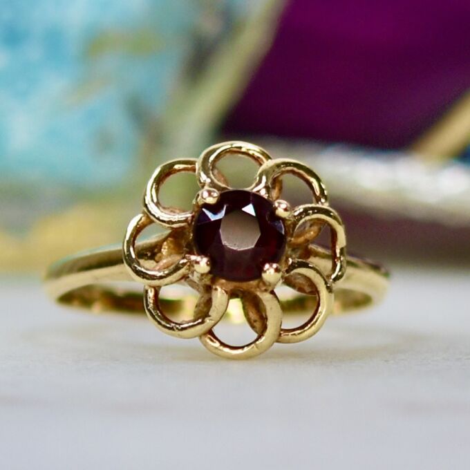 Fancy Set Garnet Solitaire Ring in 9ct Gold.