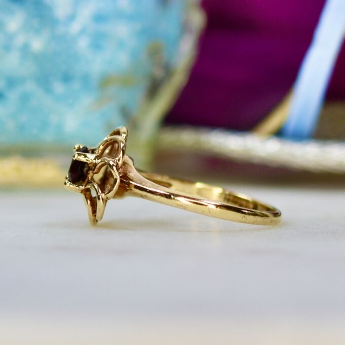 Fancy Set Garnet Solitaire Ring in 9ct Gold.