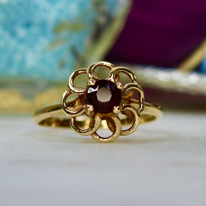 Fancy Set Garnet Solitaire Ring in 9ct Gold.