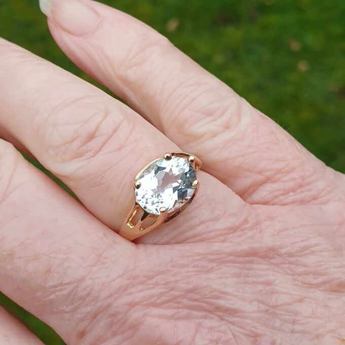 East West Blue Topaz Solitaire Ring in 9ct Gold