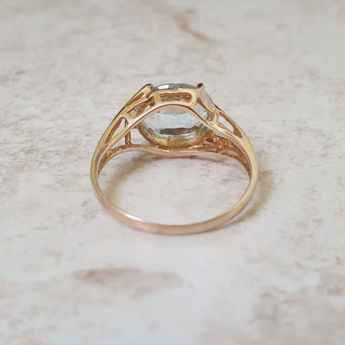 East West Blue Topaz Solitaire Ring in 9ct Gold