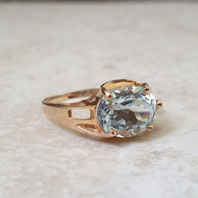 East West Blue Topaz Solitaire Ring in 9ct Gold