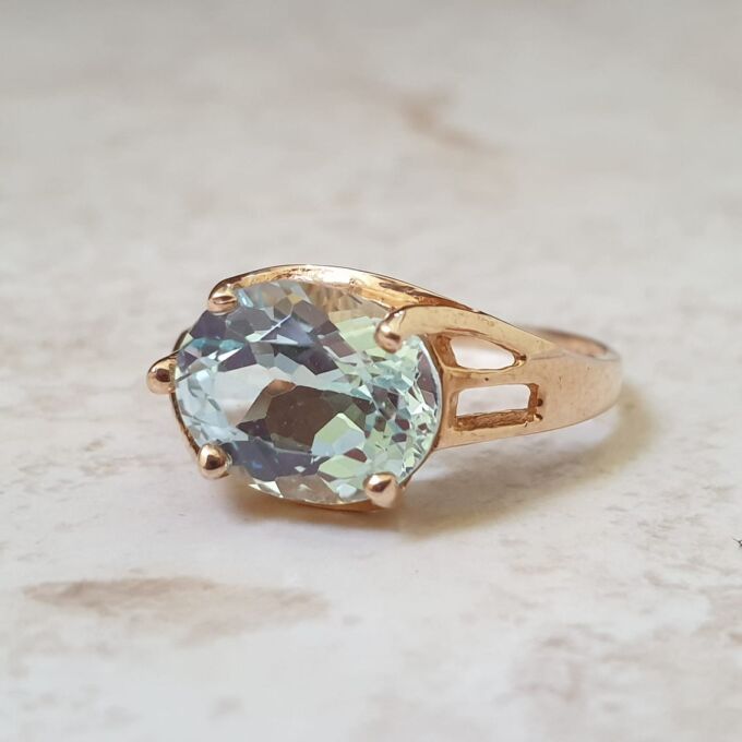 East West Blue Topaz Solitaire Ring in 9ct Gold