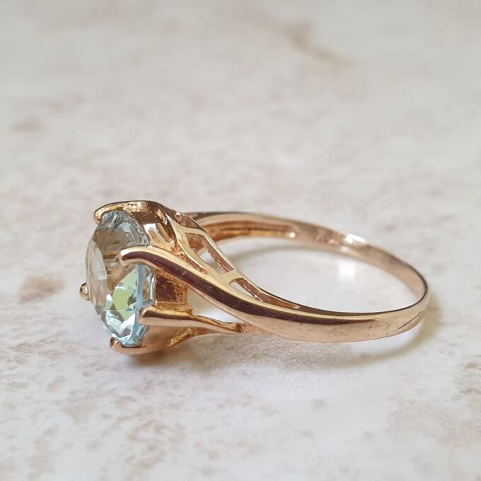 East West Blue Topaz Solitaire Ring in 9ct Gold
