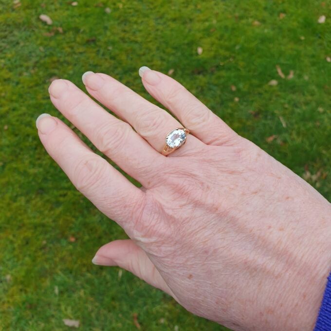 East West Blue Topaz Solitaire Ring in 9ct Gold