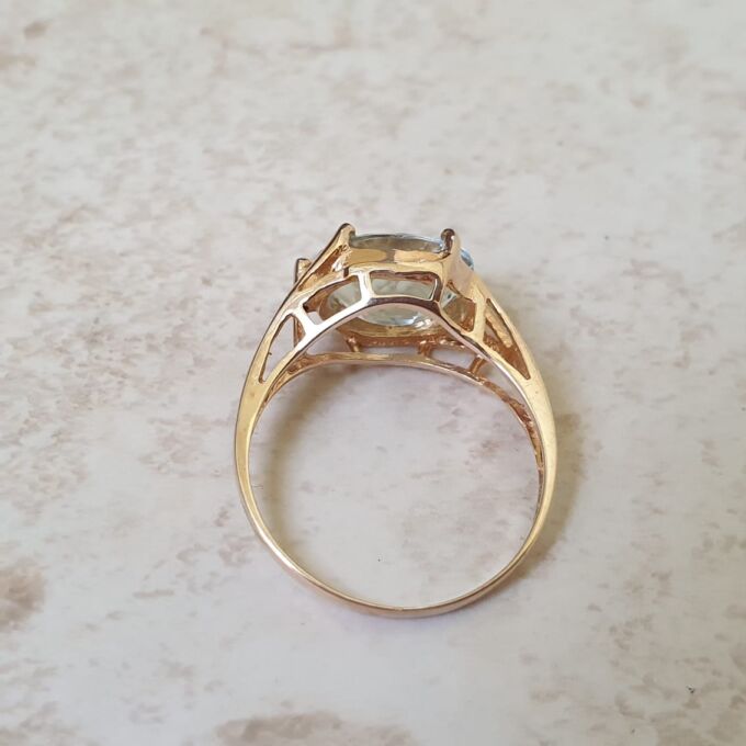 East West Blue Topaz Solitaire Ring in 9ct Gold