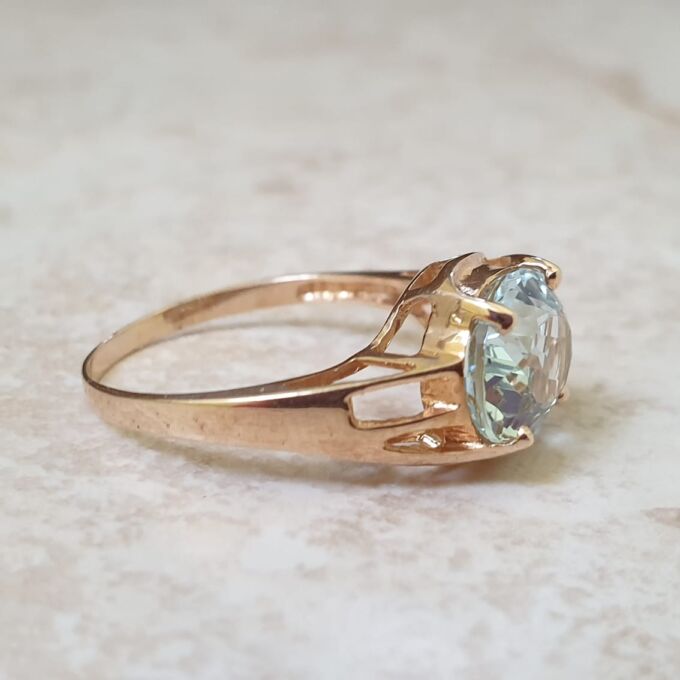 East West Blue Topaz Solitaire Ring in 9ct Gold