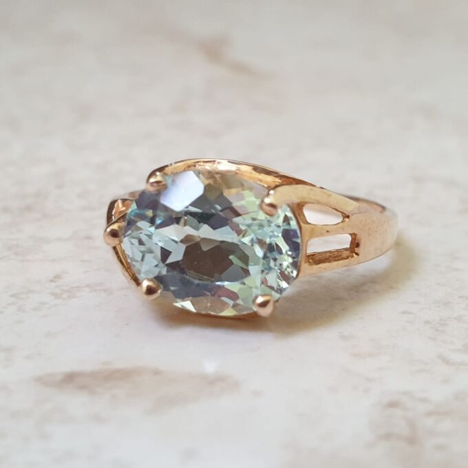 East West Blue Topaz Solitaire Ring in 9ct Gold