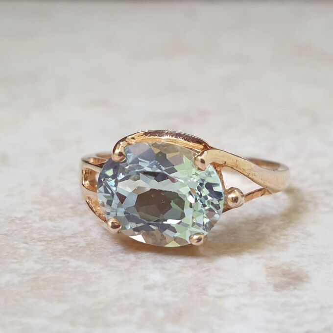 East West Blue Topaz Solitaire Ring in 9ct Gold