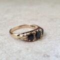 Three Stone Dark Blue Sapphire Ring in 9ct Gold