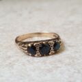 Three Stone Dark Blue Sapphire Ring in 9ct Gold