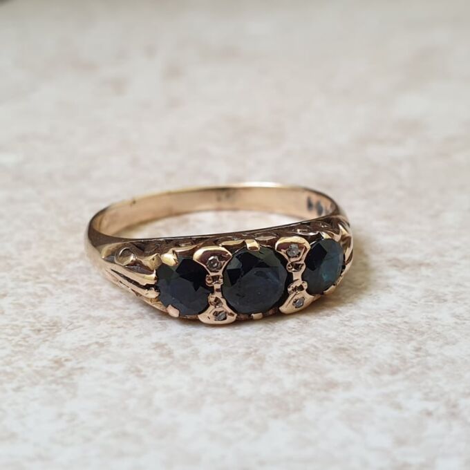 Three Stone Dark Blue Sapphire Ring in 9ct Gold