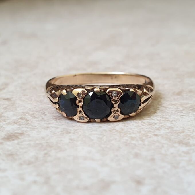 Three Stone Dark Blue Sapphire Ring in 9ct Gold