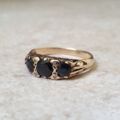 Three Stone Dark Blue Sapphire Ring in 9ct Gold