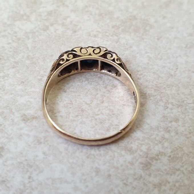 Three Stone Dark Blue Sapphire Ring in 9ct Gold