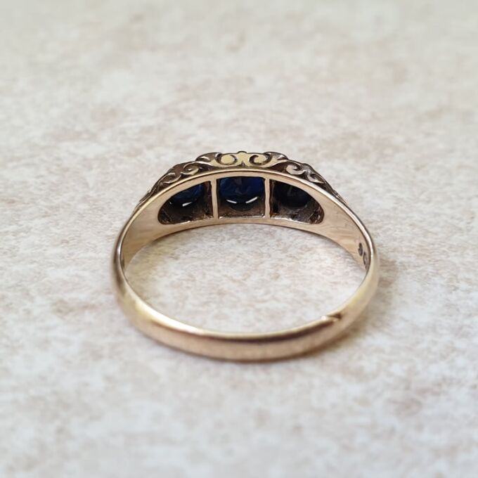 Three Stone Dark Blue Sapphire Ring in 9ct Gold