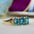Three Stone Bright Blue Zircon Ring in 9ct Gold