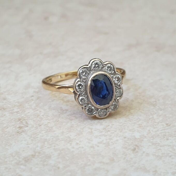 Sapphire and Diamond Cluster ring in 18ct Gold