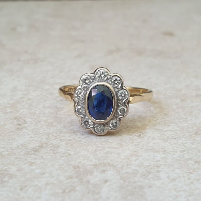 Sapphire and Diamond Cluster ring in 18ct Gold