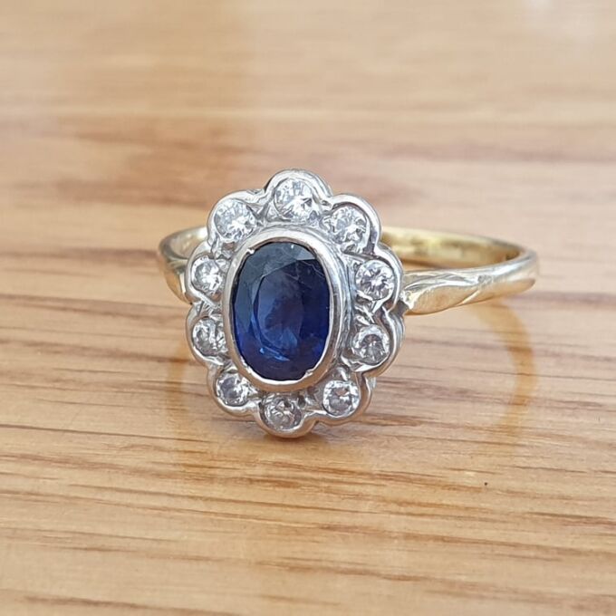 Sapphire and Diamond Cluster ring in 18ct Gold
