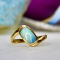 Opal Crossover Solitaire Ring in 9ct Gold