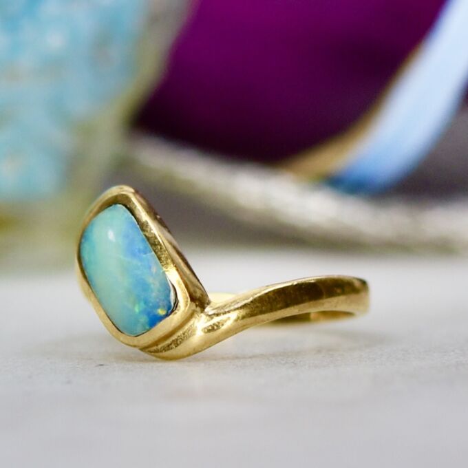 Opal Crossover Solitaire Ring in 9ct Gold