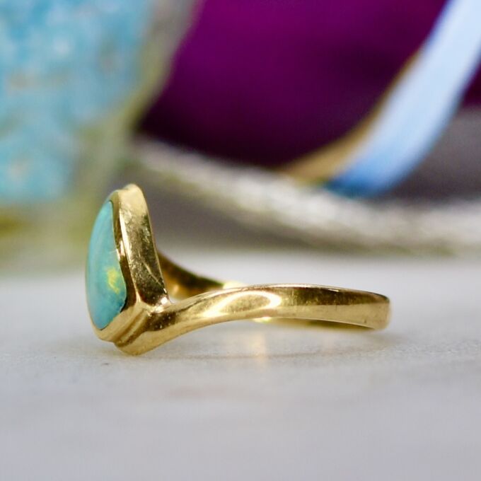 Opal Crossover Solitaire Ring in 9ct Gold