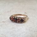 Seven Stone Garnet Ring in 9ct Gold