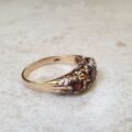 Seven Stone Garnet Ring in 9ct Gold
