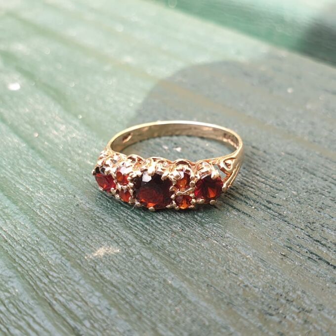 Seven Stone Garnet Ring in 9ct Gold