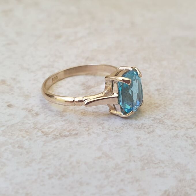 Swiss Blue Topaz Solitaire Ring in 9ct Gold