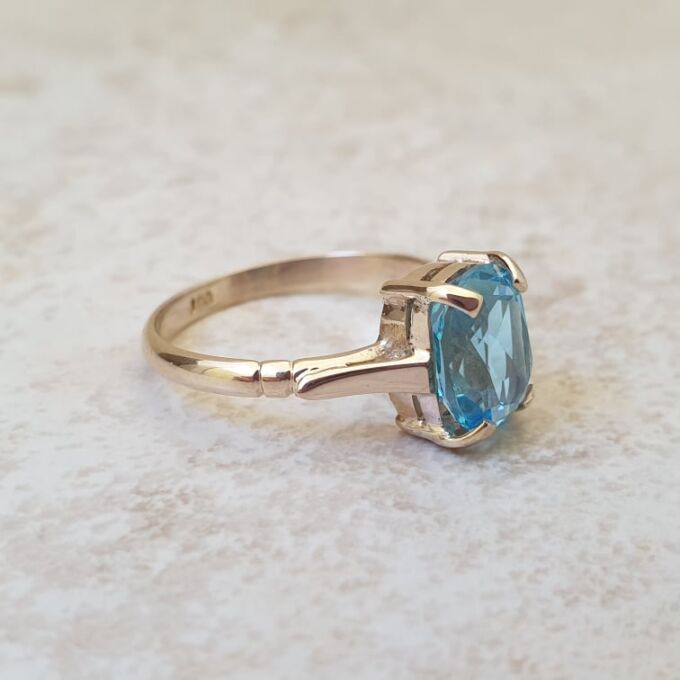 Swiss Blue Topaz Solitaire Ring in 9ct Gold