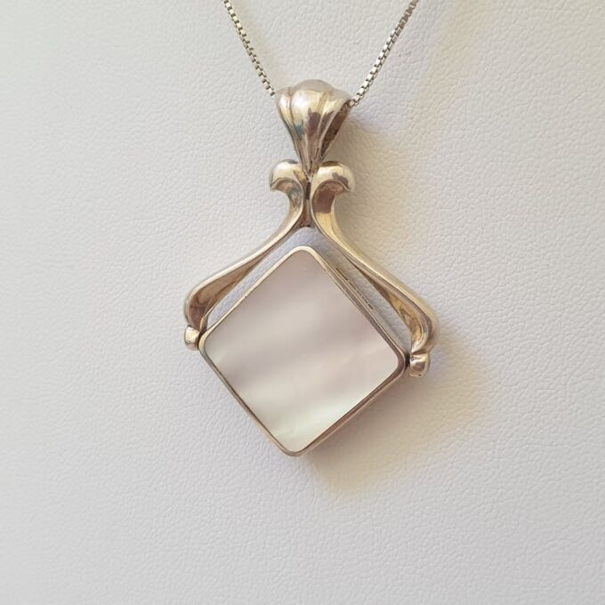 Two Sided Spinner Pendant in Sterling Silver