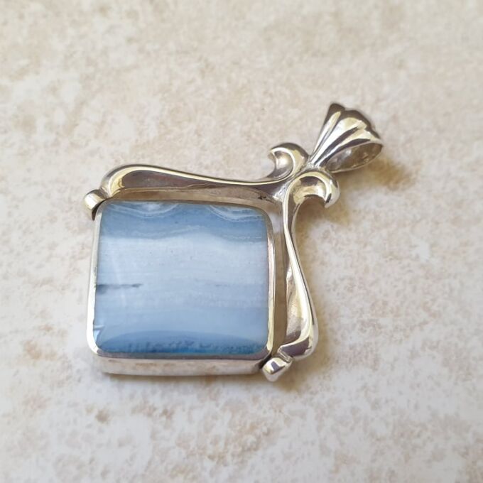 Two Sided Spinner Pendant in Sterling Silver