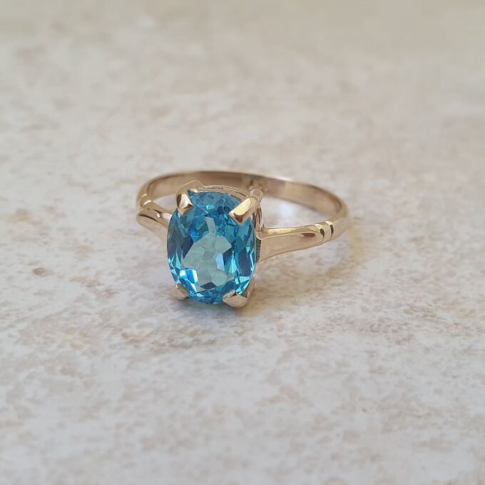 Swiss Blue Topaz Solitaire Ring in 9ct Gold