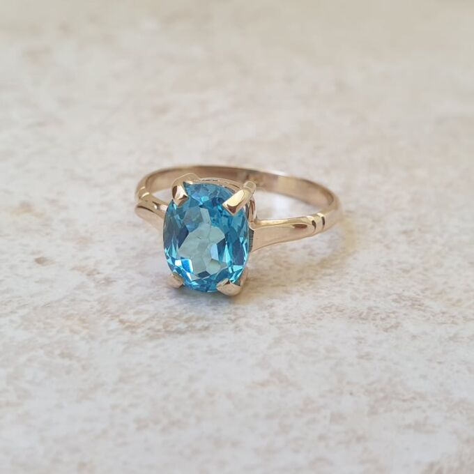 Swiss Blue Topaz Solitaire Ring in 9ct Gold