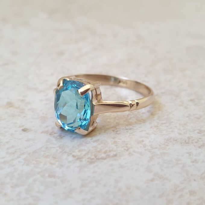 Swiss Blue Topaz Solitaire Ring in 9ct Gold