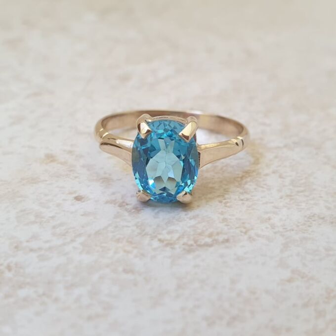 Swiss Blue Topaz Solitaire Ring in 9ct Gold