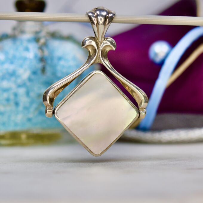 Two Sided Spinner Pendant in Sterling Silver