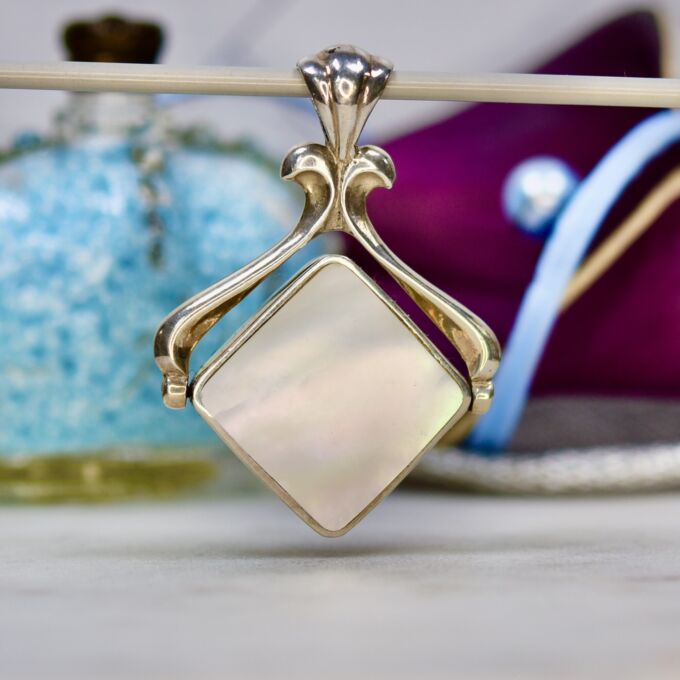 Two Sided Spinner Pendant in Sterling Silver