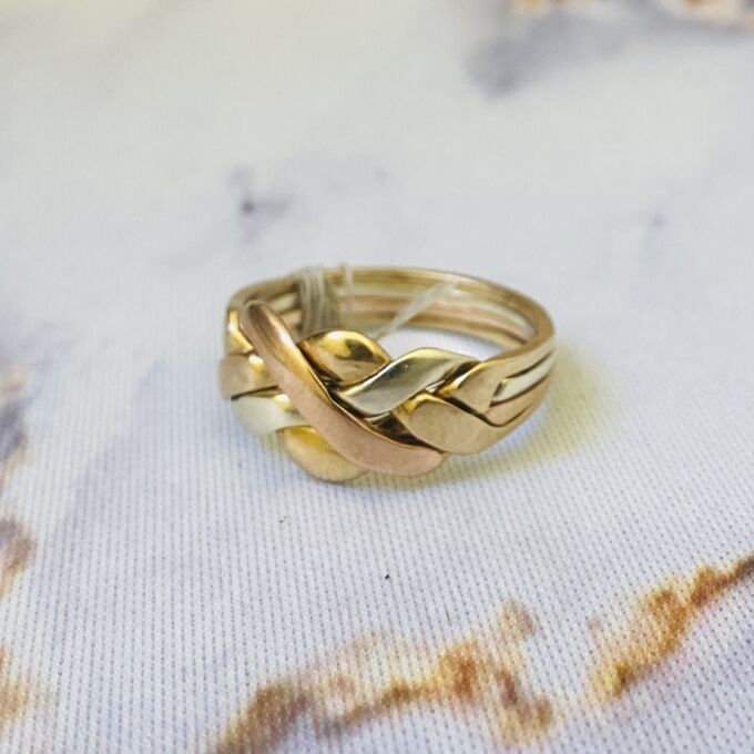 Four Piece Puzzle Ring in 9ct Gold