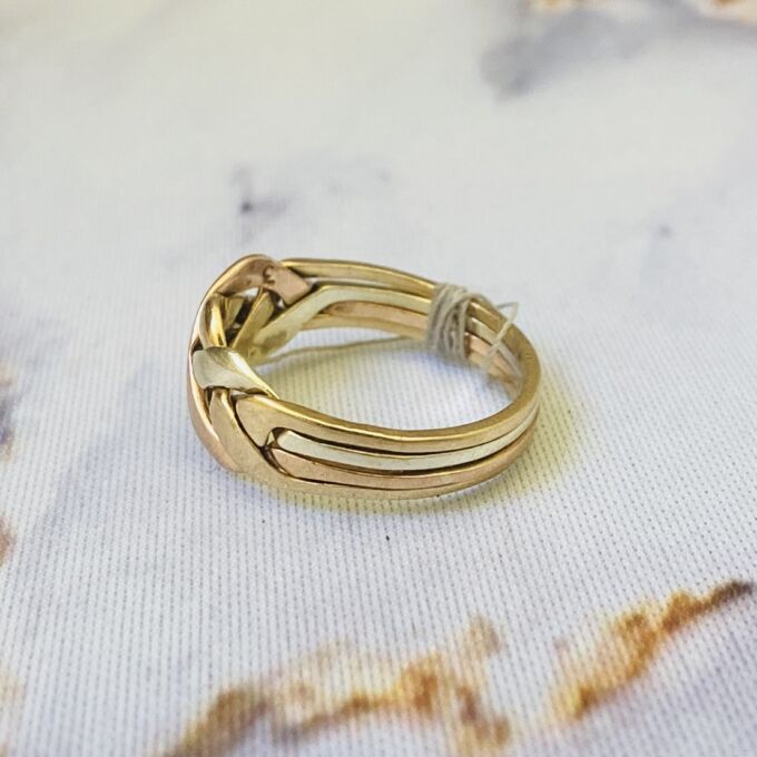 Four Piece Puzzle Ring in 9ct Gold