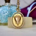 Oval Shield Antique Medallion Pendant in 9ct Gold